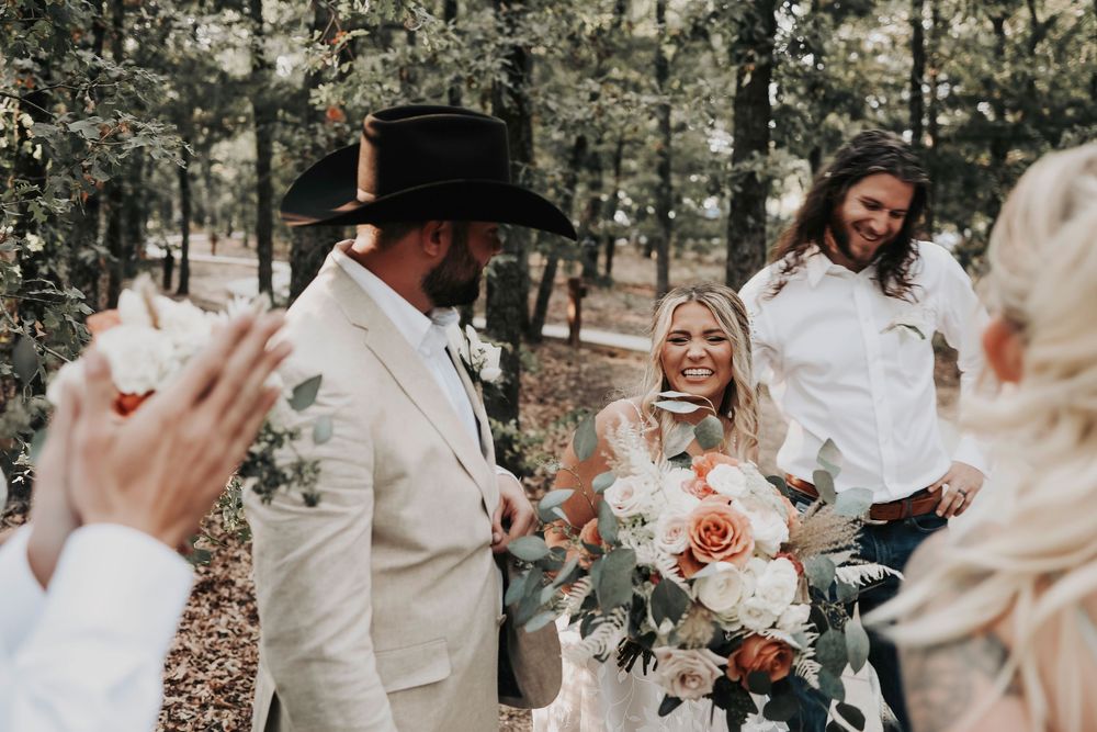 Joyful “just married” kiss at altar – April Pinto Photography
