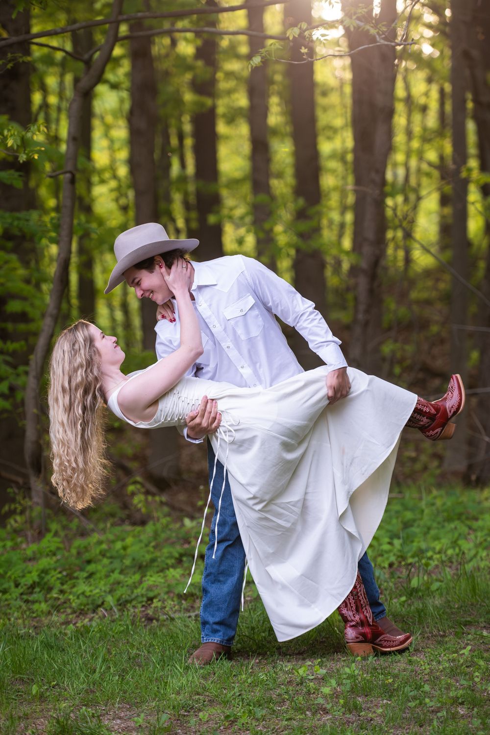 A romantic dance dip pose captured in sequence across four forest photos showing movement from left to right.