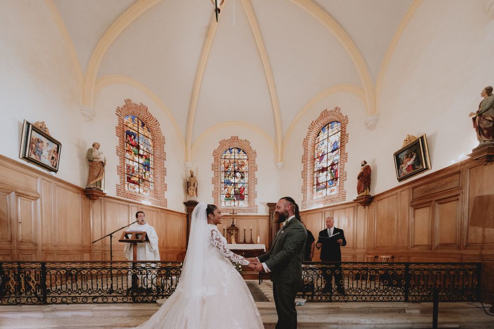 Sacred wedding ceremony inside the historic chapel of Chateau de Vallery France