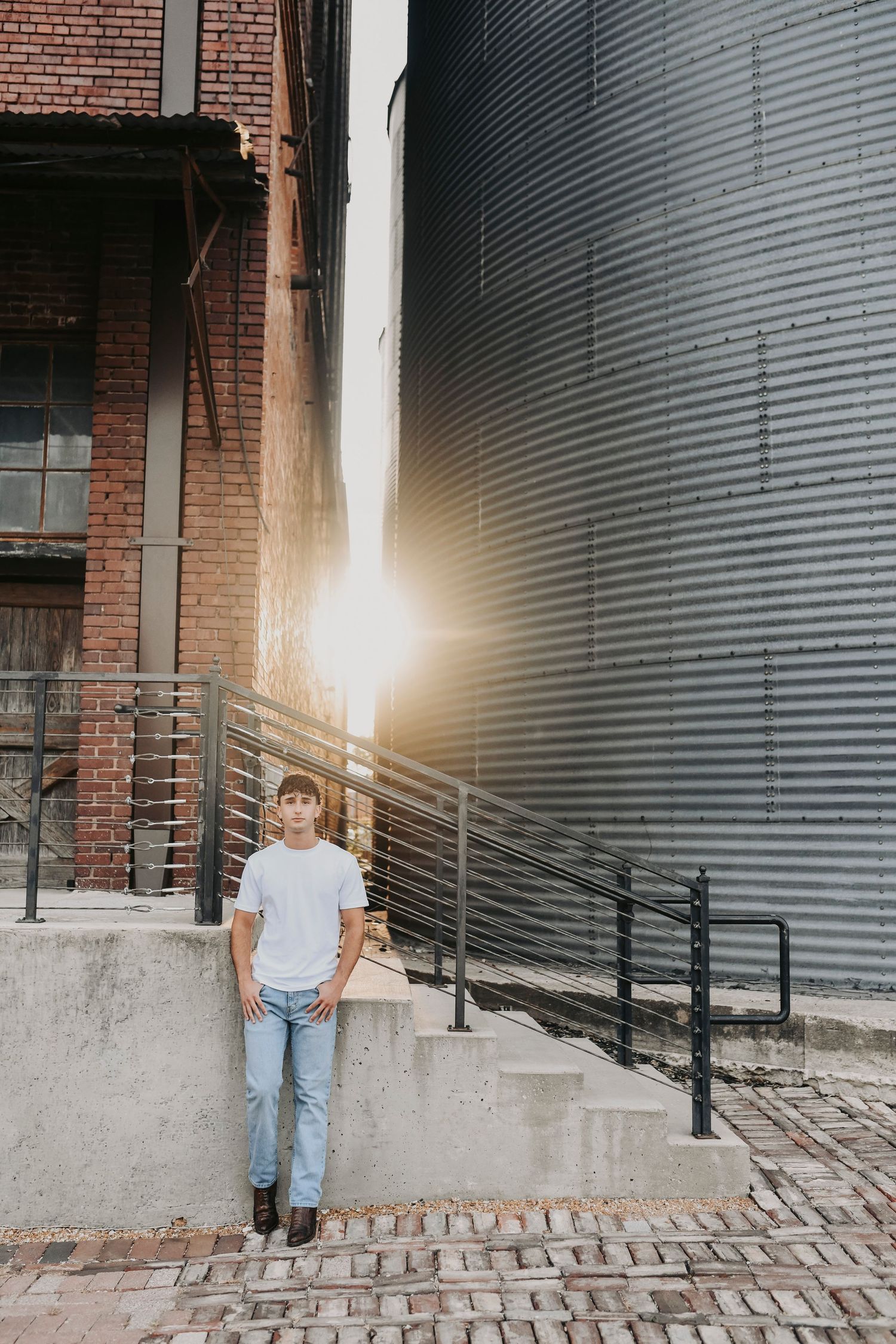 High school senior photos in downtown McKinney Texas at sunset