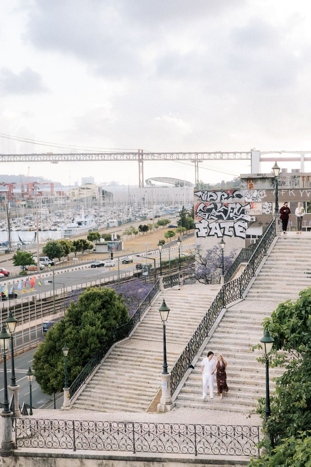 Romantic Lisbon engagement session with cinematic city atmosphere