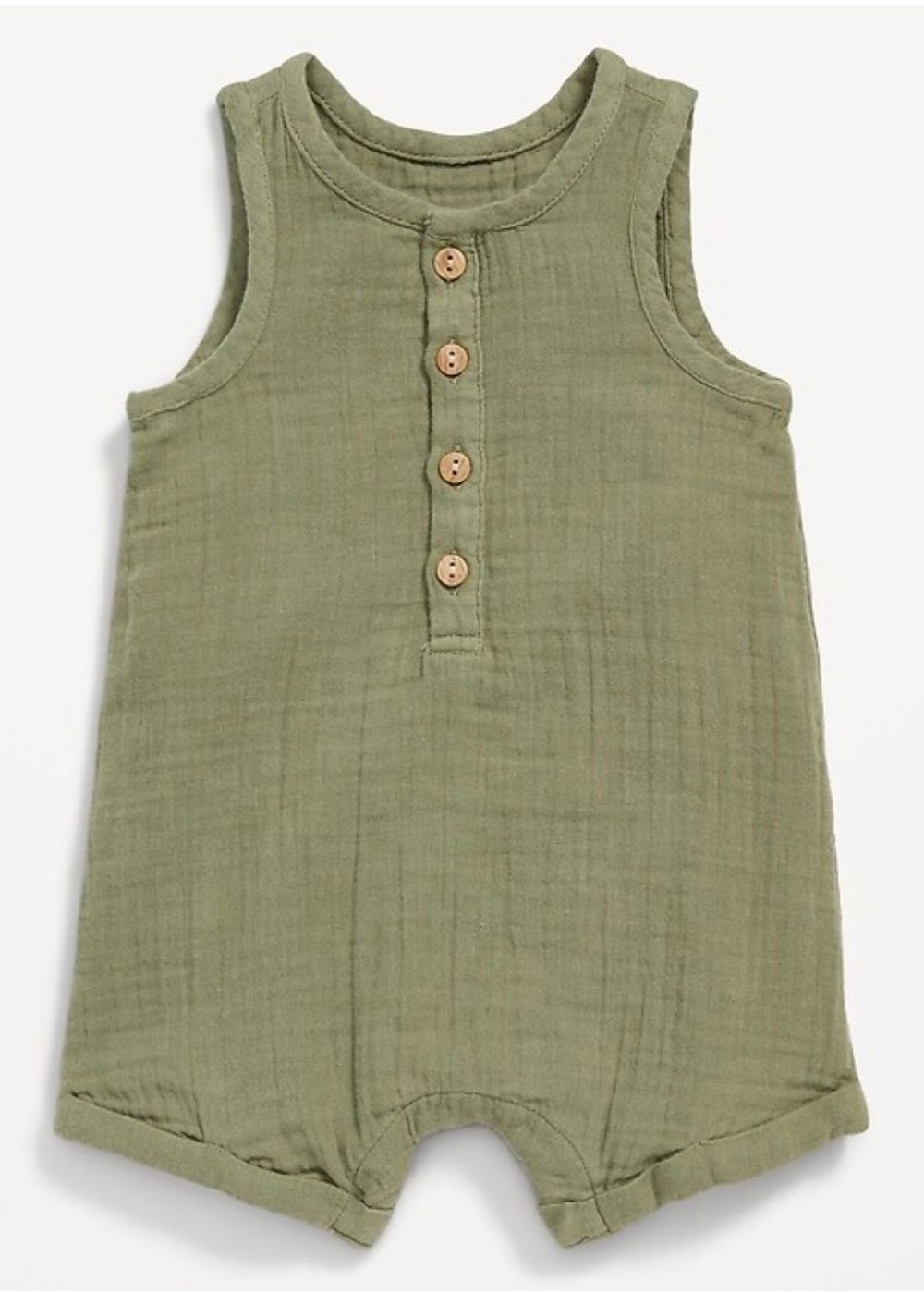 Sage green sleeveless baby romper with button placket and short legs in textured muslin fabric.