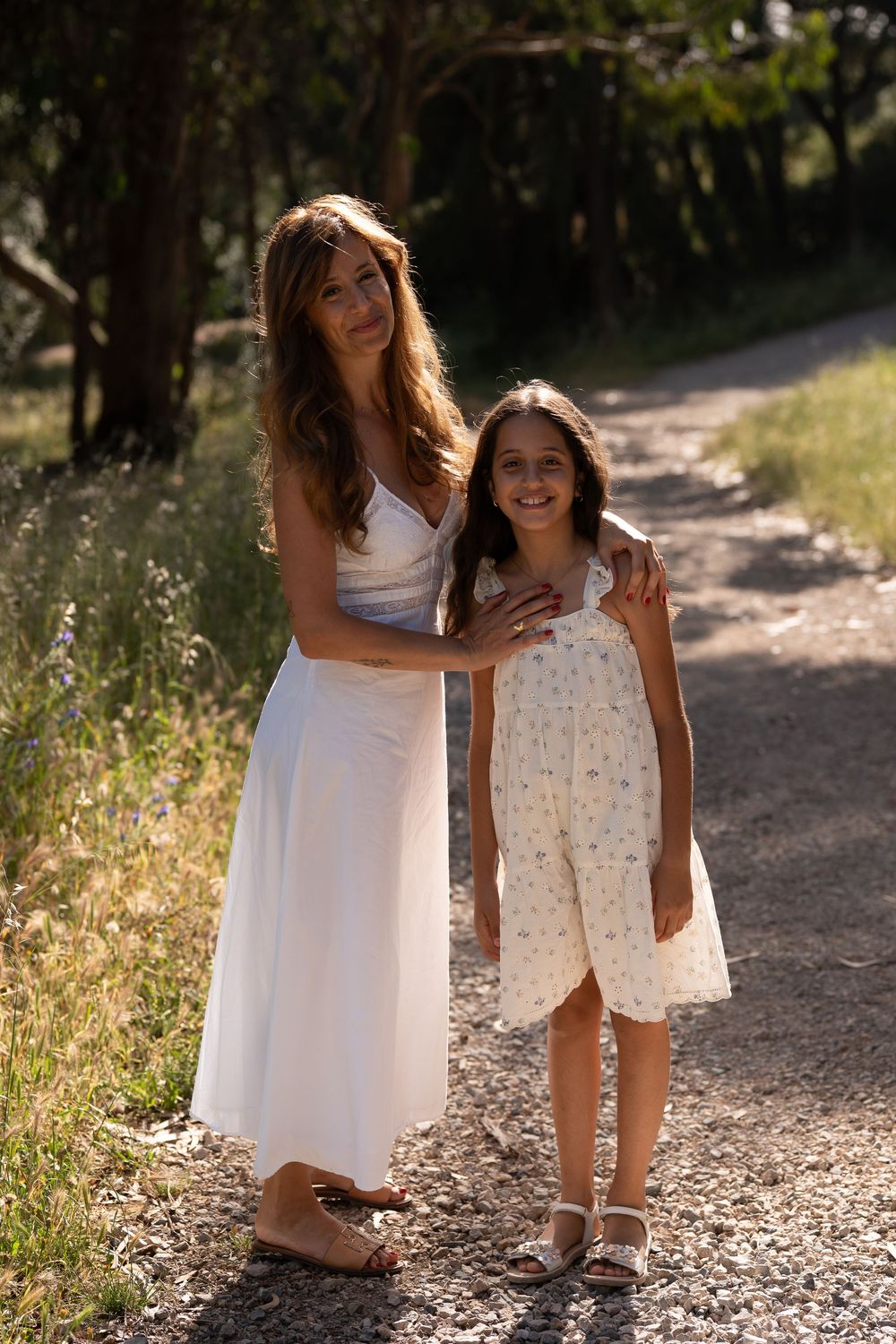 Mother and daughter in evening sunlight