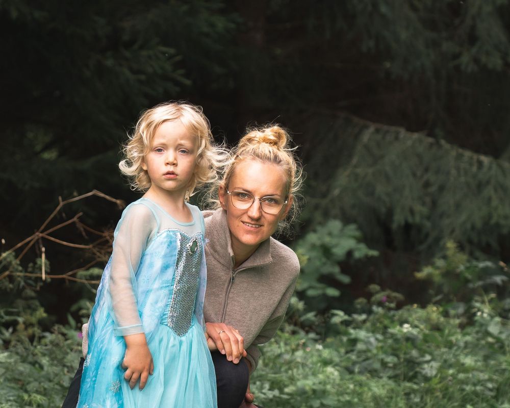 Mother and daughter in the forest