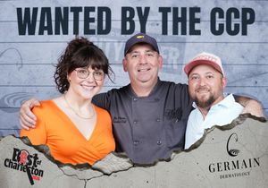Three people including a chef posing at the Wanted by the CCP Best of Charleston event.