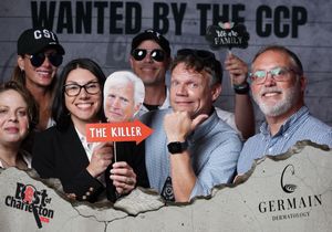 Group of people pose with humorous props at a Best of Charleston City Paper CCP awards event.