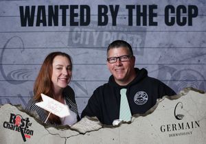 A smiling man and woman pose together at a Best of Charleston City Paper CCP awards event.