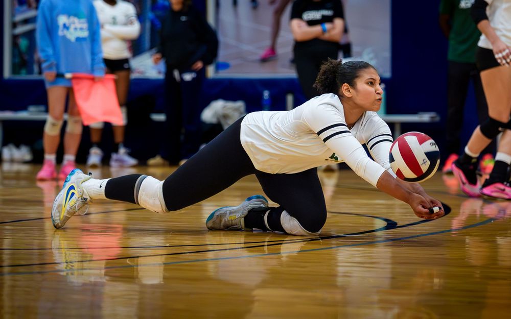 Asphalt Green VB Club player dives for a dig at May Madness, Spooky Nook by Deanna Fox, SportsFox Photography based in Hershey PA