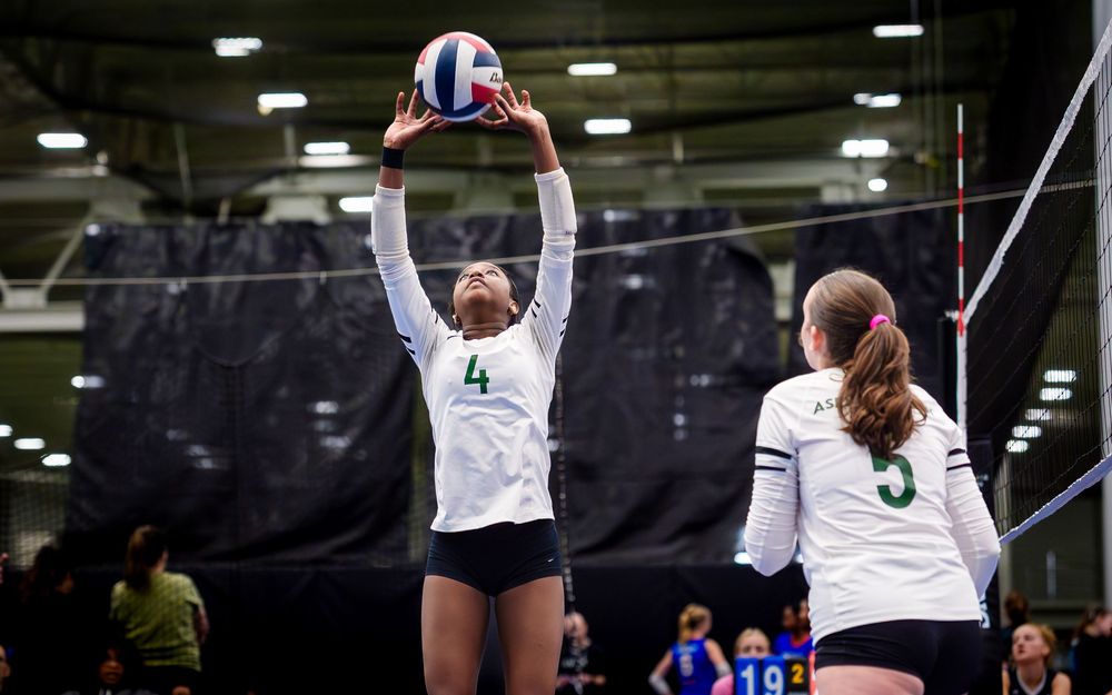 Asphalt Green VB Club player sets the ball during May Madness at Spooky Nook by Deanna Fox, SportsFox Photography based in Hershey PA