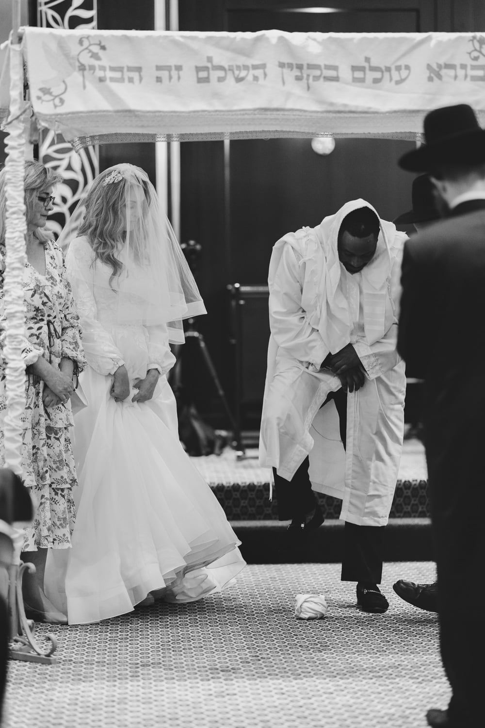 Black and white photo of a couple during a traditional wedding ceremony in Toronto