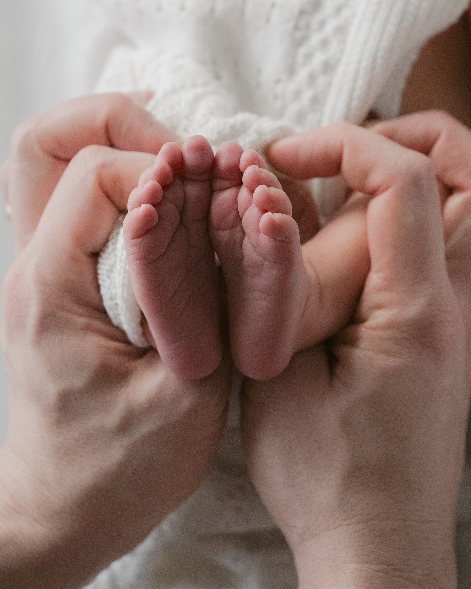 Detail photo of newborn babies tiny toes, Vancouver in home newborn session