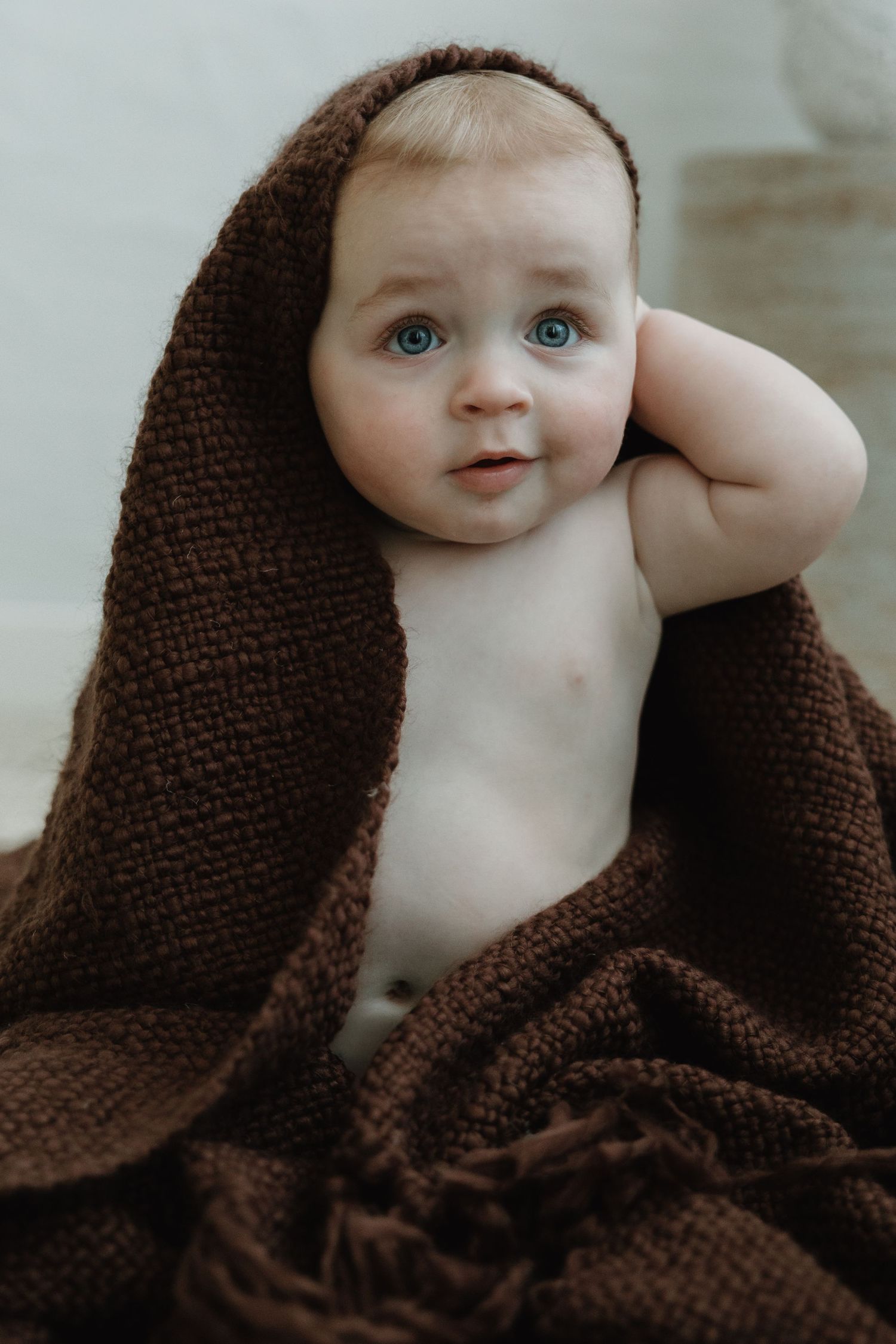 Natural family photography session capturing connection indoor studio Wagga Wagga milestone baby