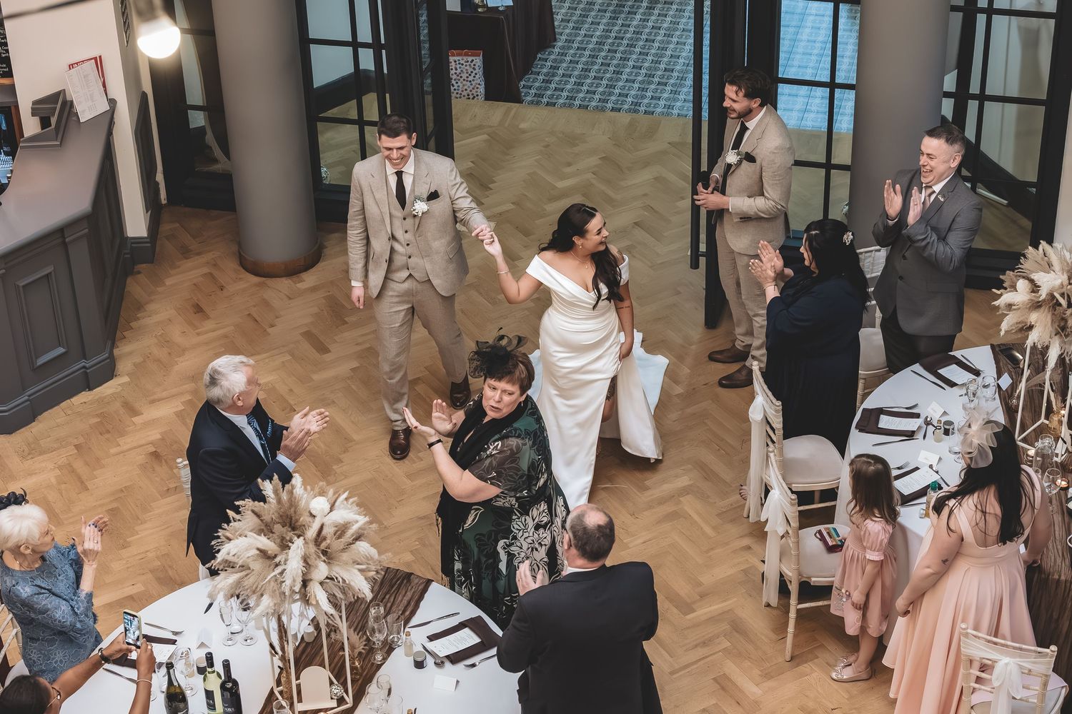 A present wedding couple enjoying every moment of their day.