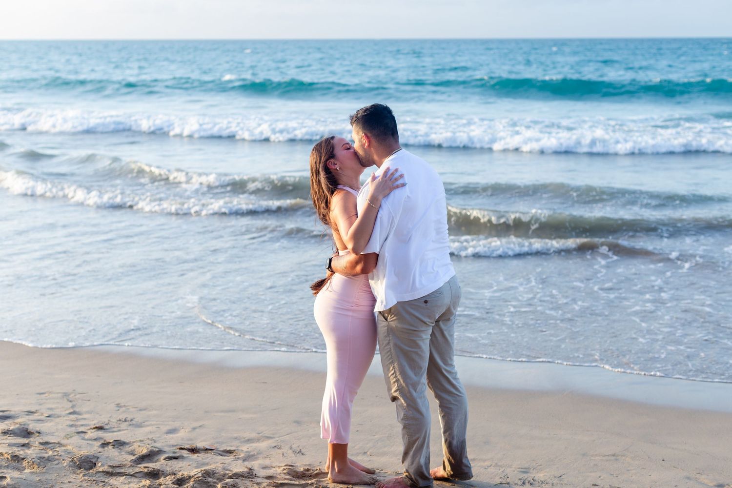 Couples portrait at the beach in Isla Verde, Carolina, Puerto Rico.