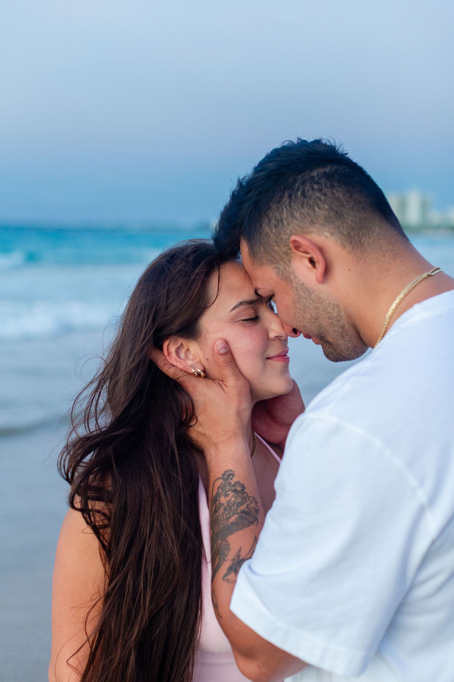 Couples portrait at the beach in Isla Verde, Carolina, Puerto Rico.