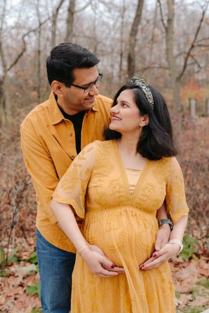 A maternity photo of a couple