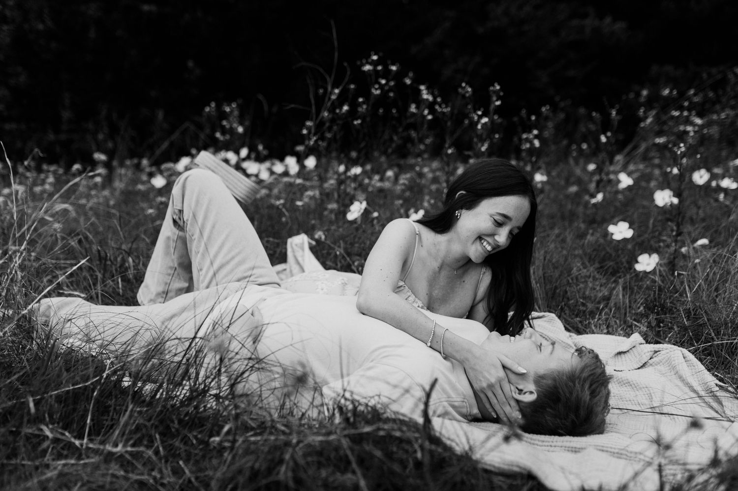 Wichita KS outdoor engagement photos in nature location Andover, couple photos in field with flowers, small elopement wedding photographer