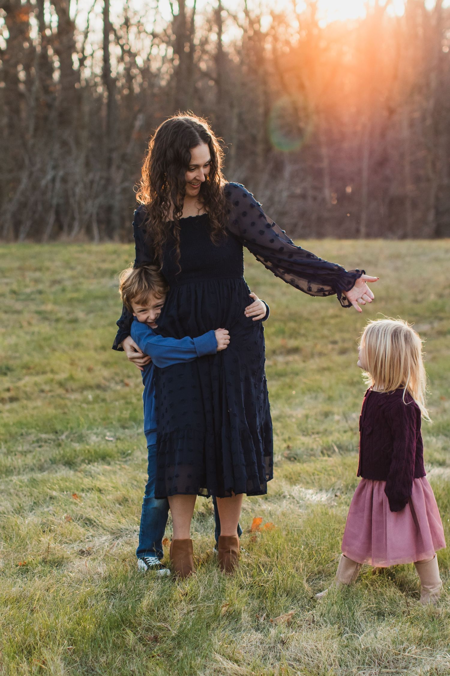 Mom with two kids playing field, what to wear to your family photography session in Metro Detroit and south lyon, Michigan area.