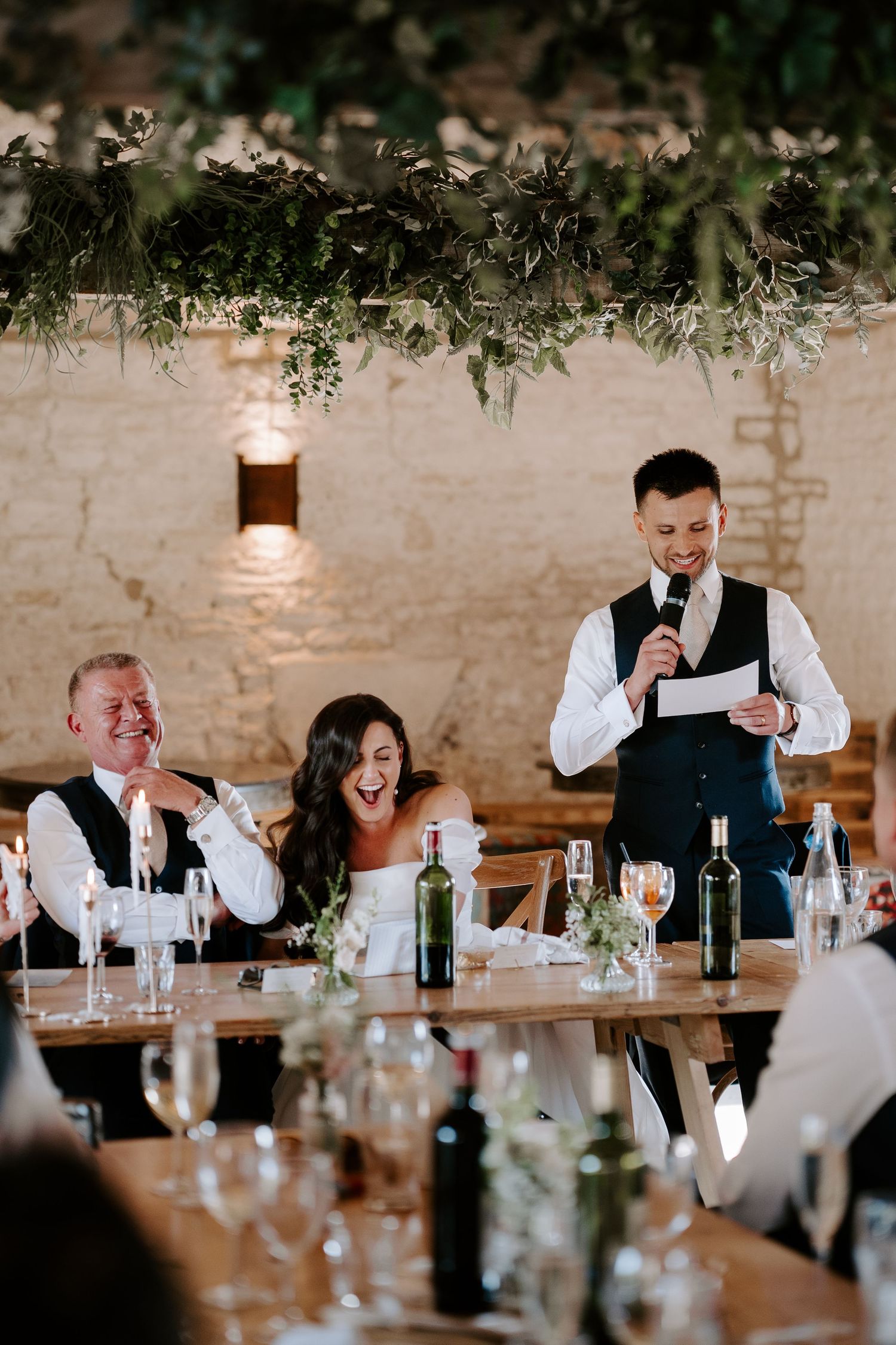 groom giving speech during wedding breakfast at yardspace old gore cirencester