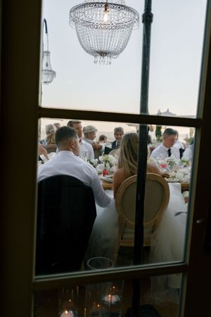 View through a window of an elegant dining room with crystal chandelier.

Auberge du Soleil Wedding
Carneros Resort Wedding
Meadowood Weddin