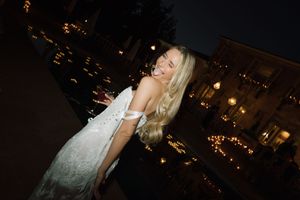 A dimly lit nighttime celebration with glowing lights creating an atmospheric ambiance.
