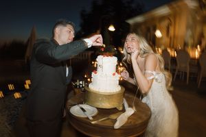 Wedding celebration at night with dancing and cake cutting moments.