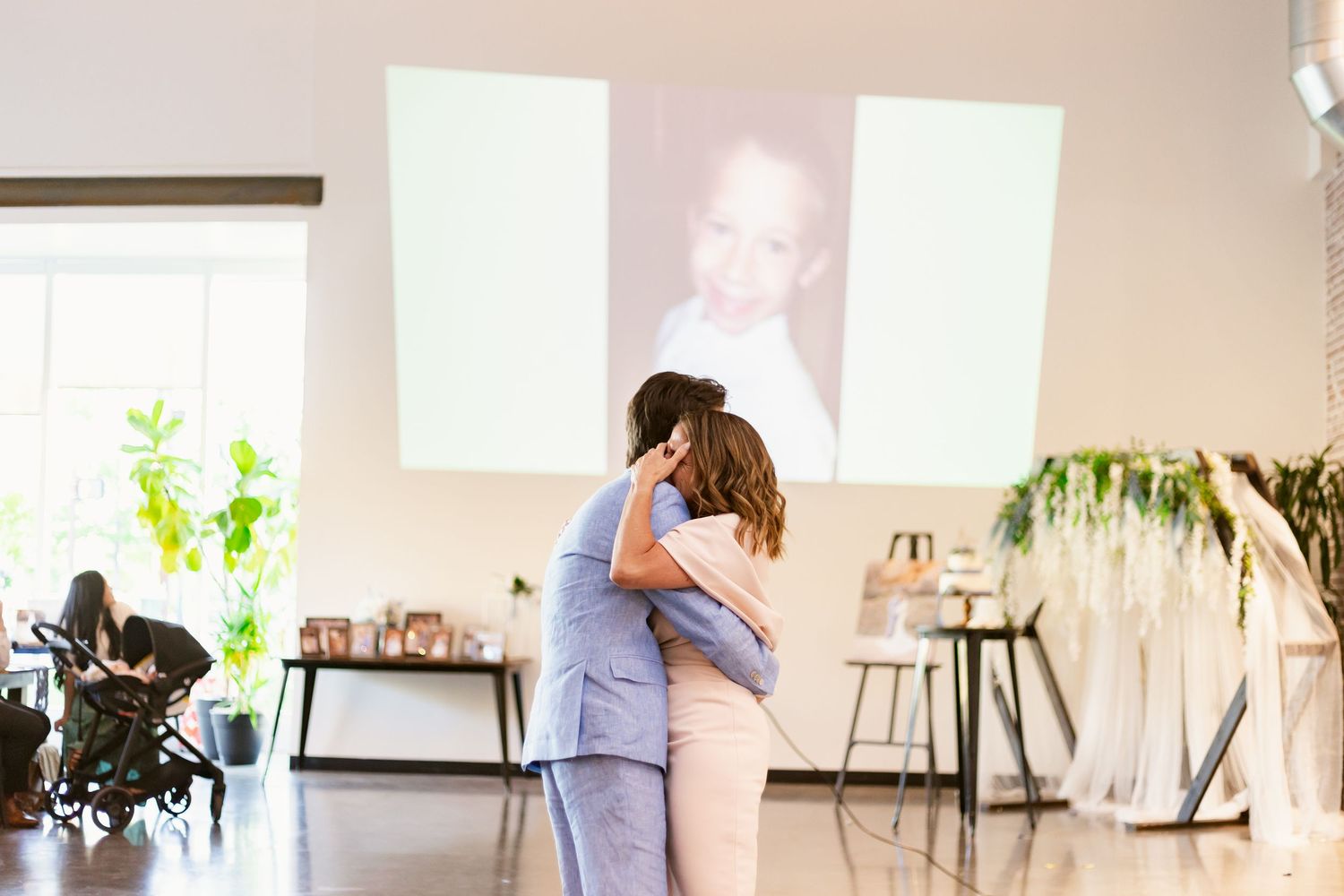 emotional mother and groom dance at missouri wedding reception