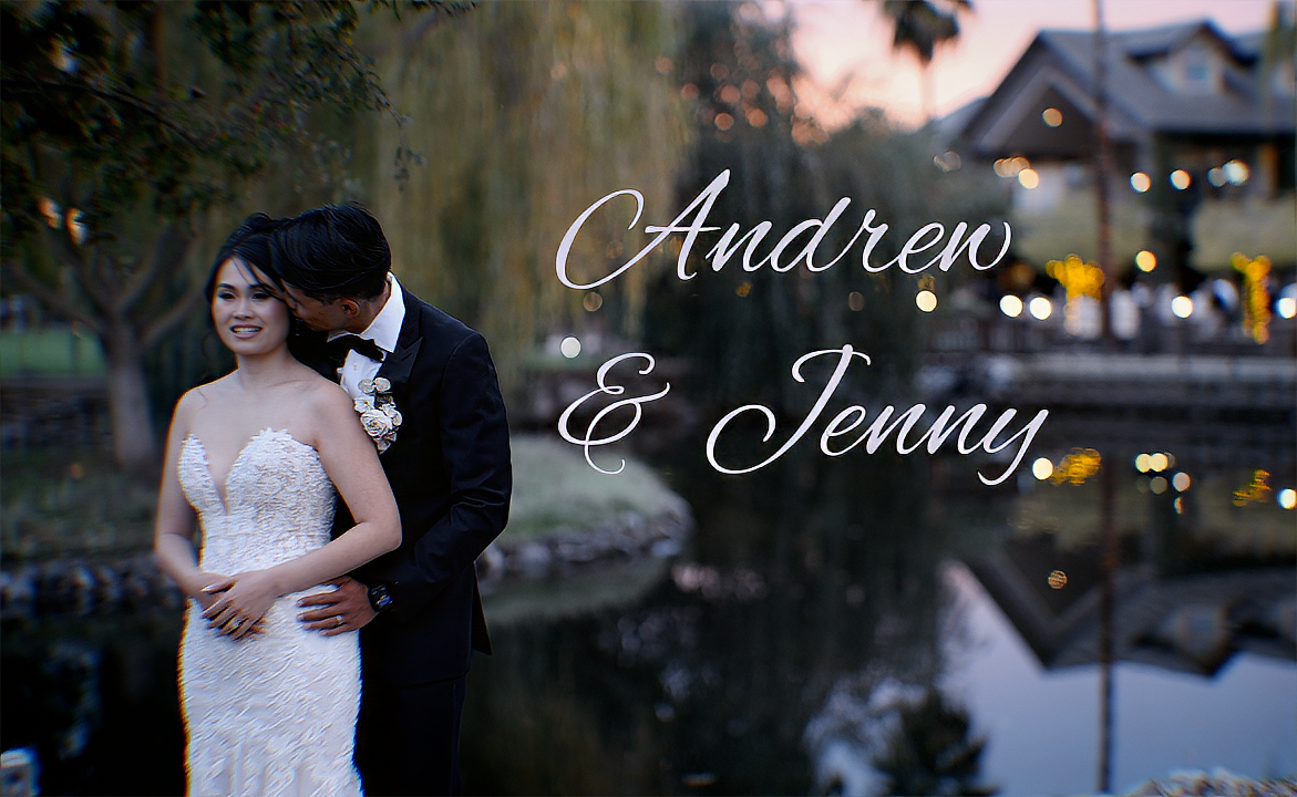 Romantic couple in formal attire embraces during sunset at an outdoor wedding venue.