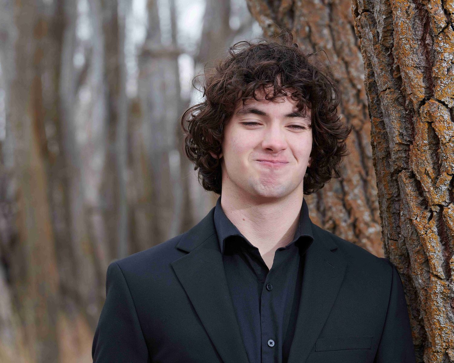 Marshall trying not to laugh during his high school senior photo session in Okanogan, WA.