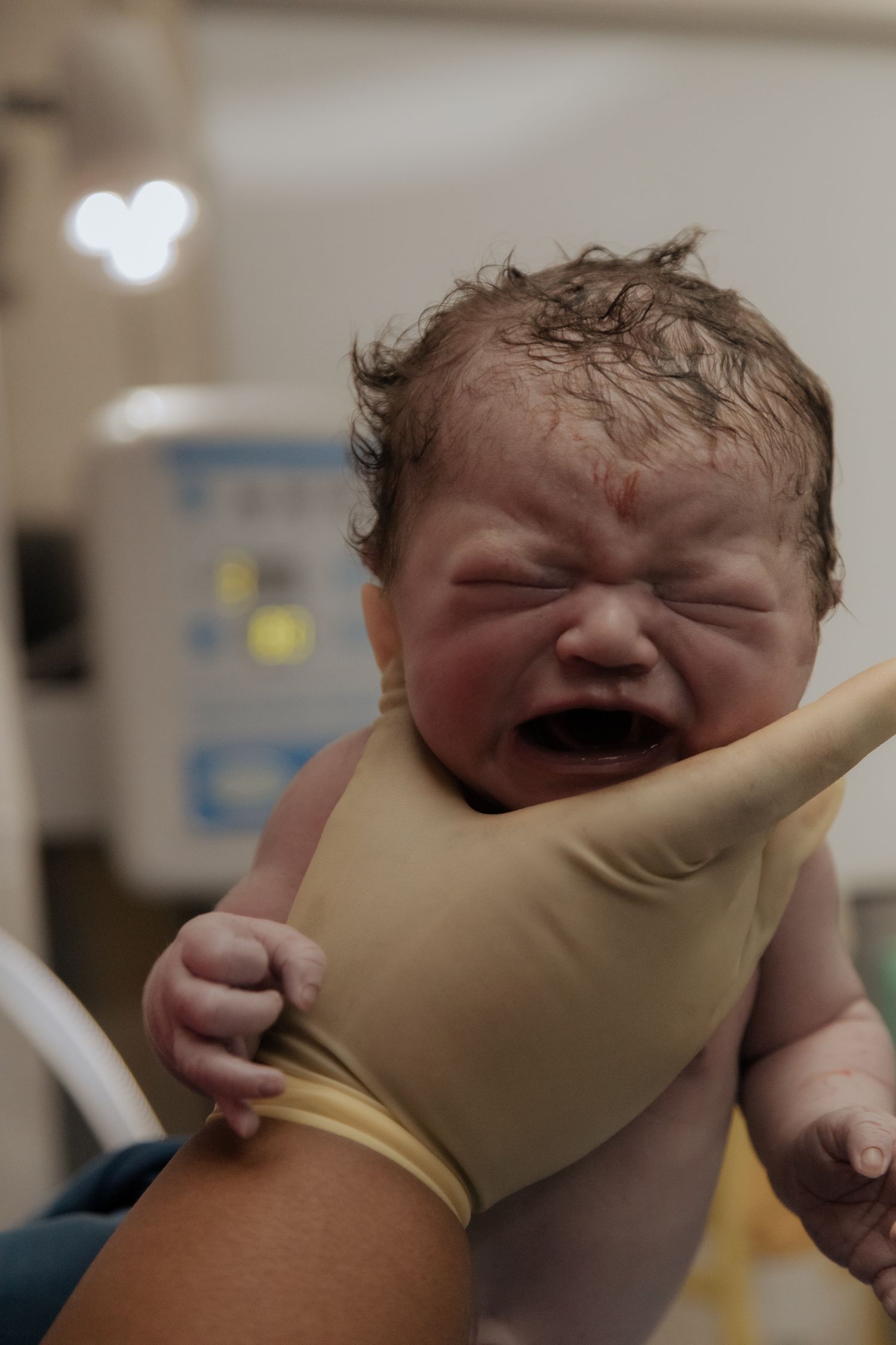 Emotional birth photography in Johannesburg showing skin-to-skin contact, newborn bonding, and the power of childbirth.
