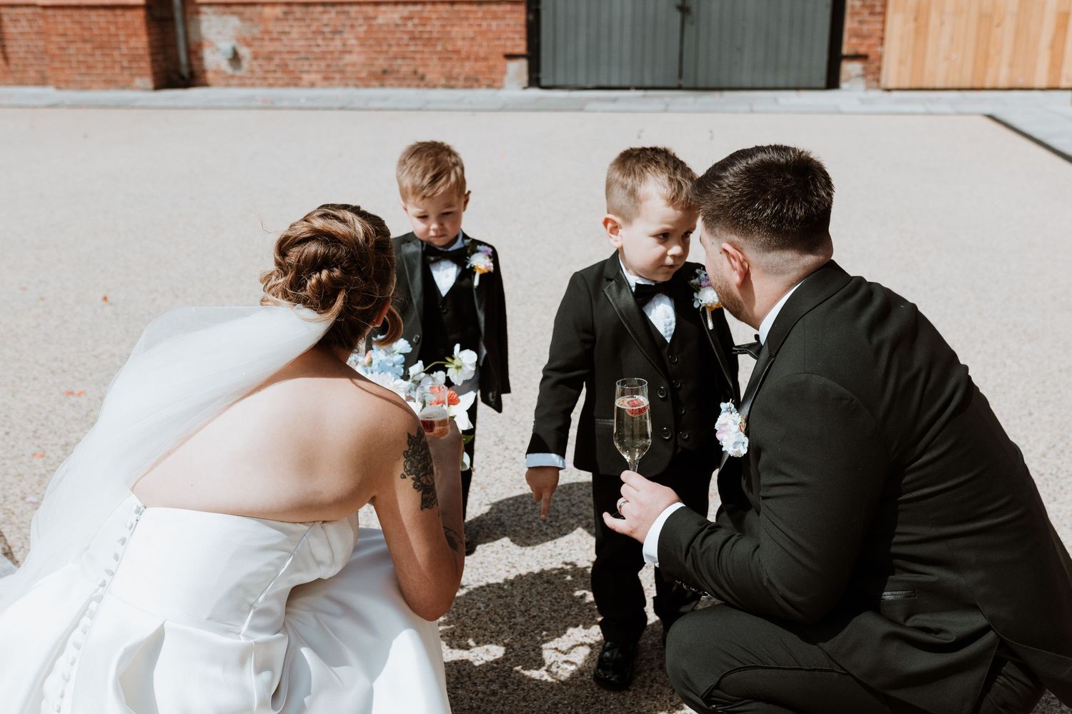 Wedding at Chester Zoo, couple with their kids after ceremony