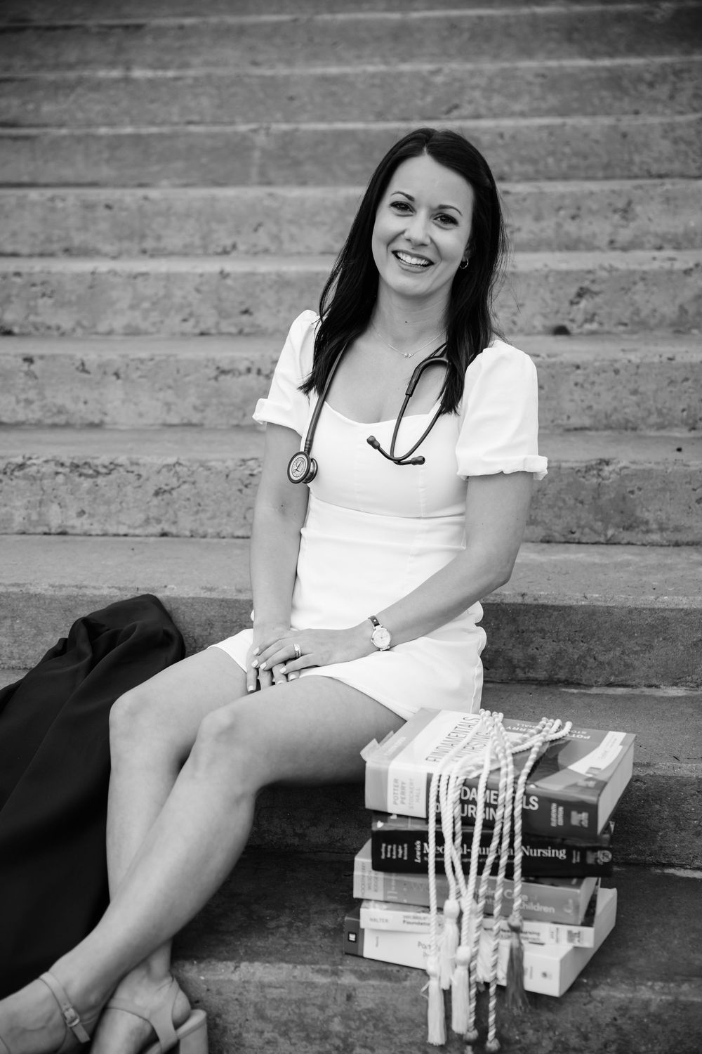 Black and white portraits on steps featuring medical study materials and casual poses.