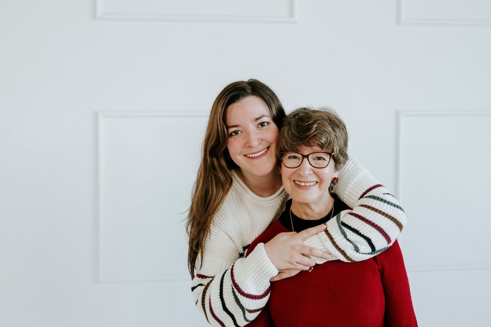 A series of four candid photos showing a parent and child sharing joyful moments together against a light background.
