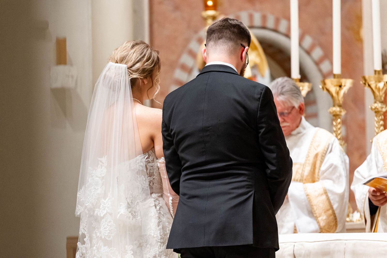 bride and groom at the altar