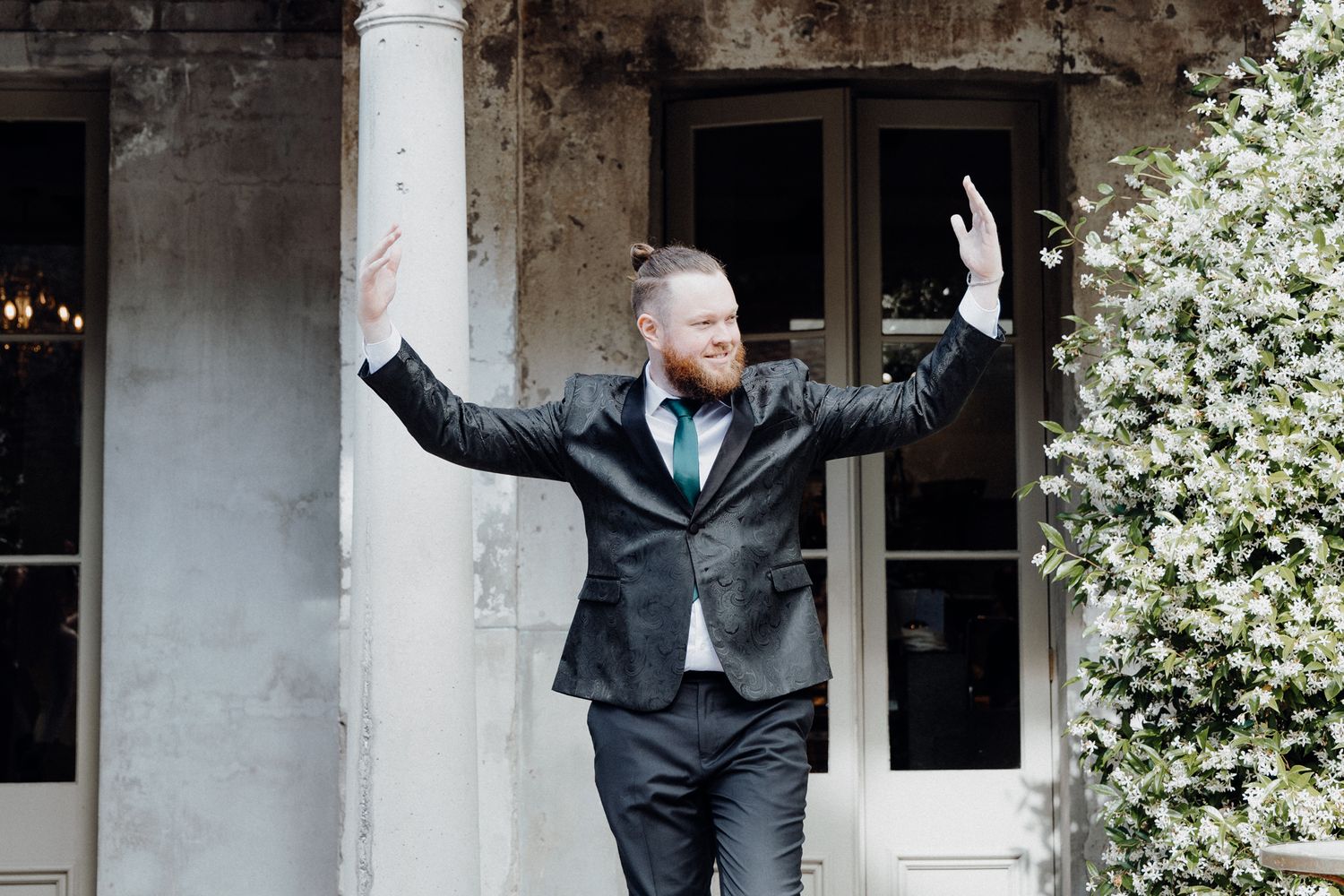The groom's entrance for his wedding ceremony, captured by Apertured Media Auckland Wedding Photographer.