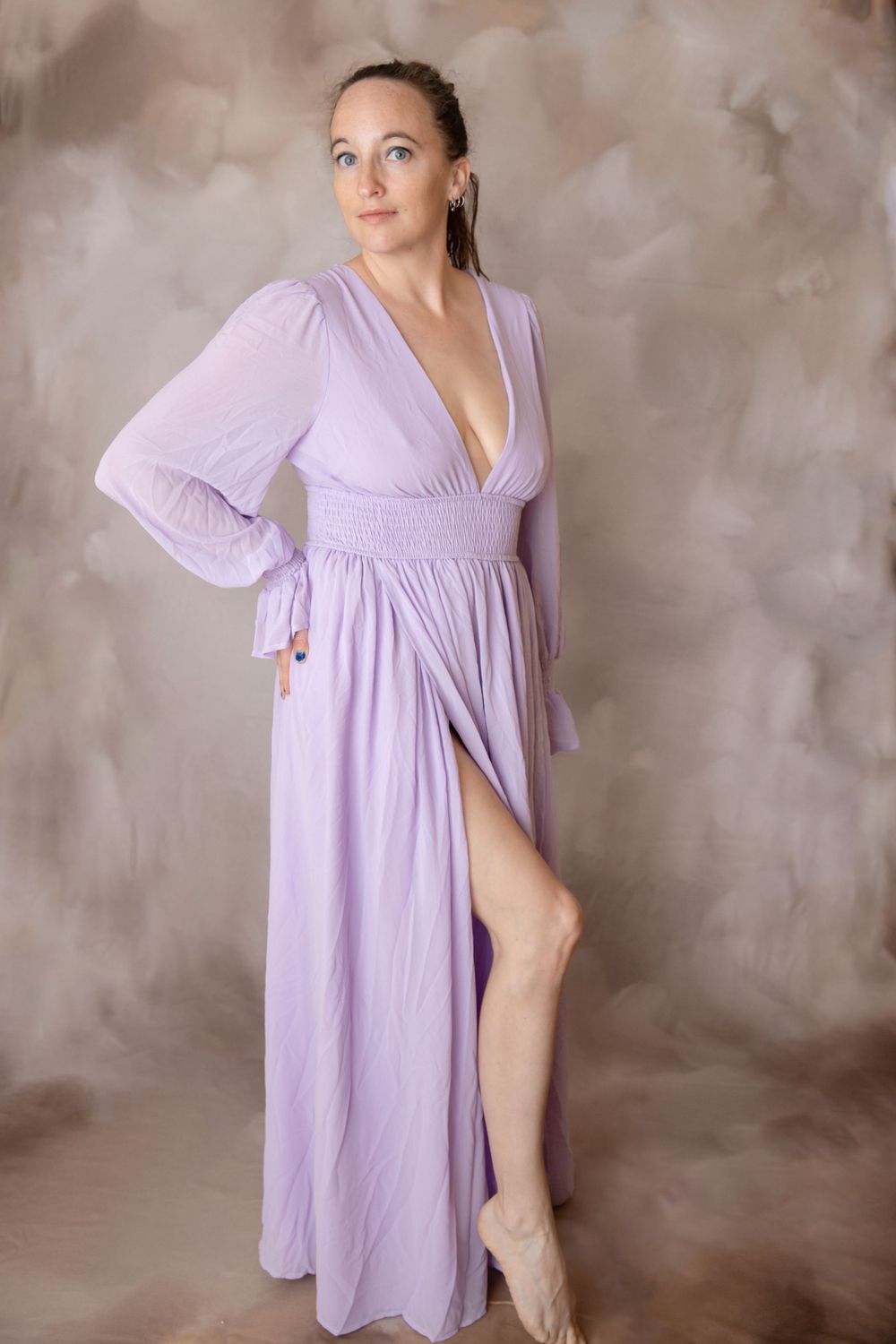 Woman in lavender gown during a Central Florida maternity photography session.