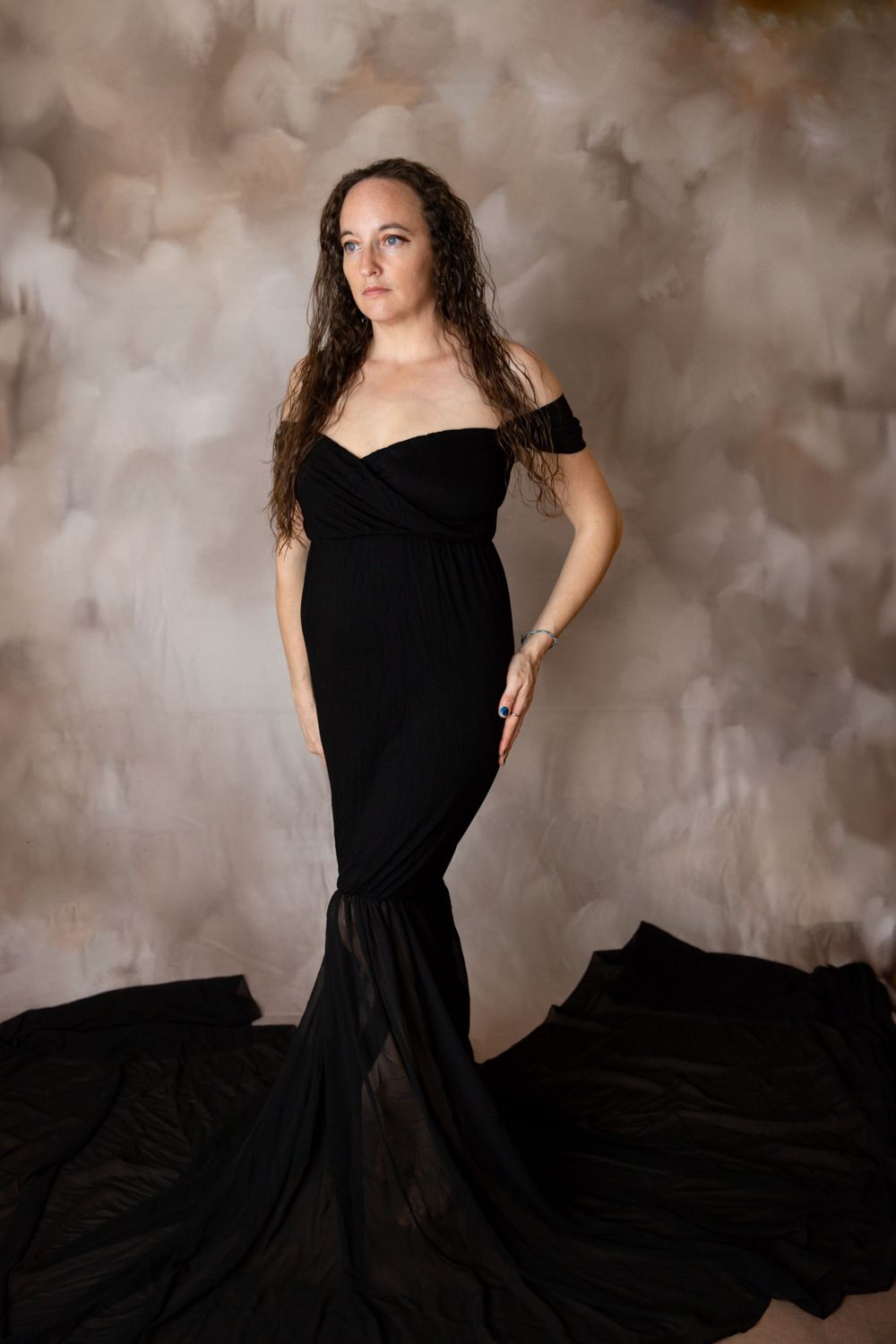 Elegant maternity portrait in black gown during Central Florida maternity photography session.
