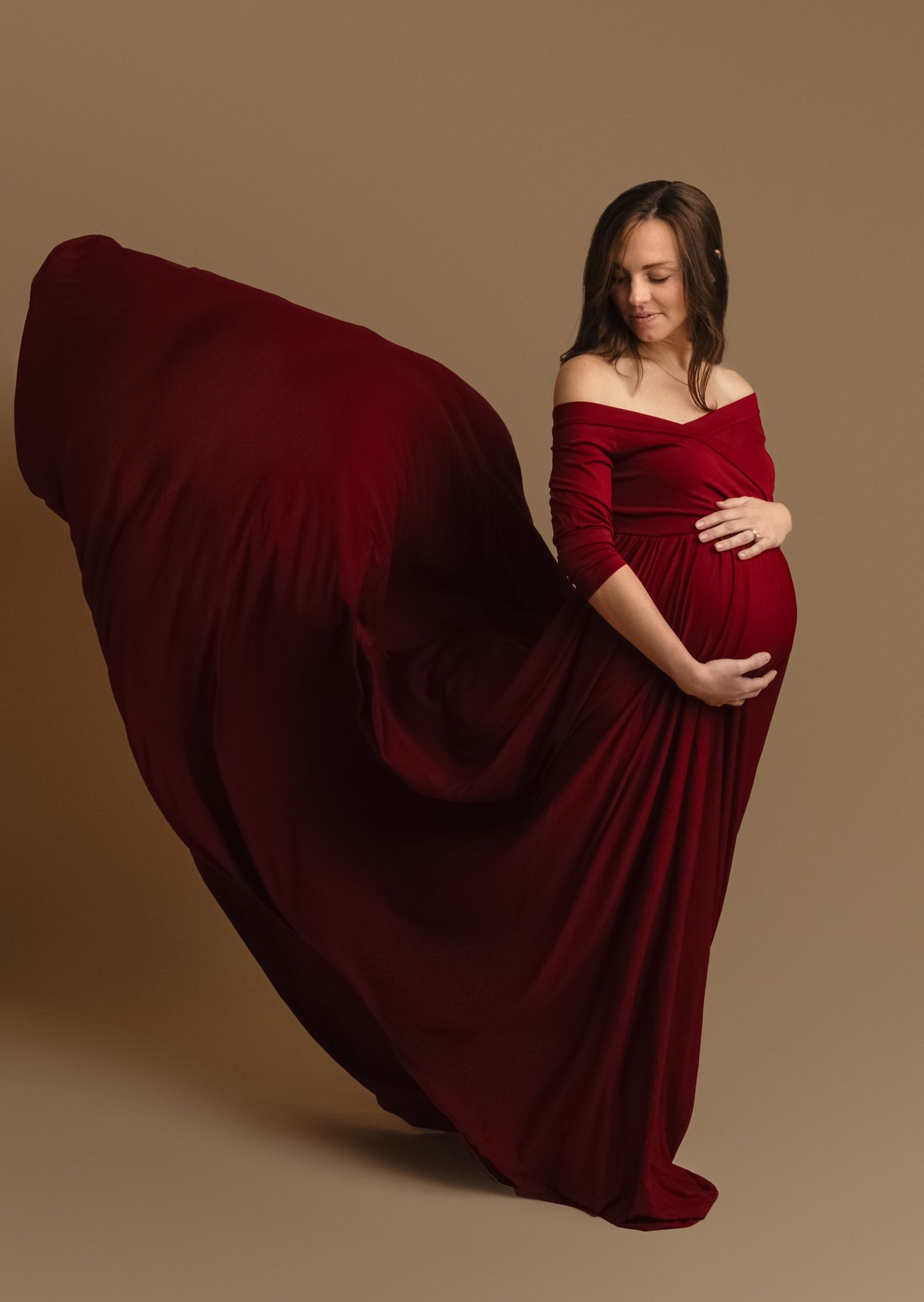 Harrisonburg photographer, newborn, maternity, family, baby, pregnant mama in dramatic red dress swooped into the air