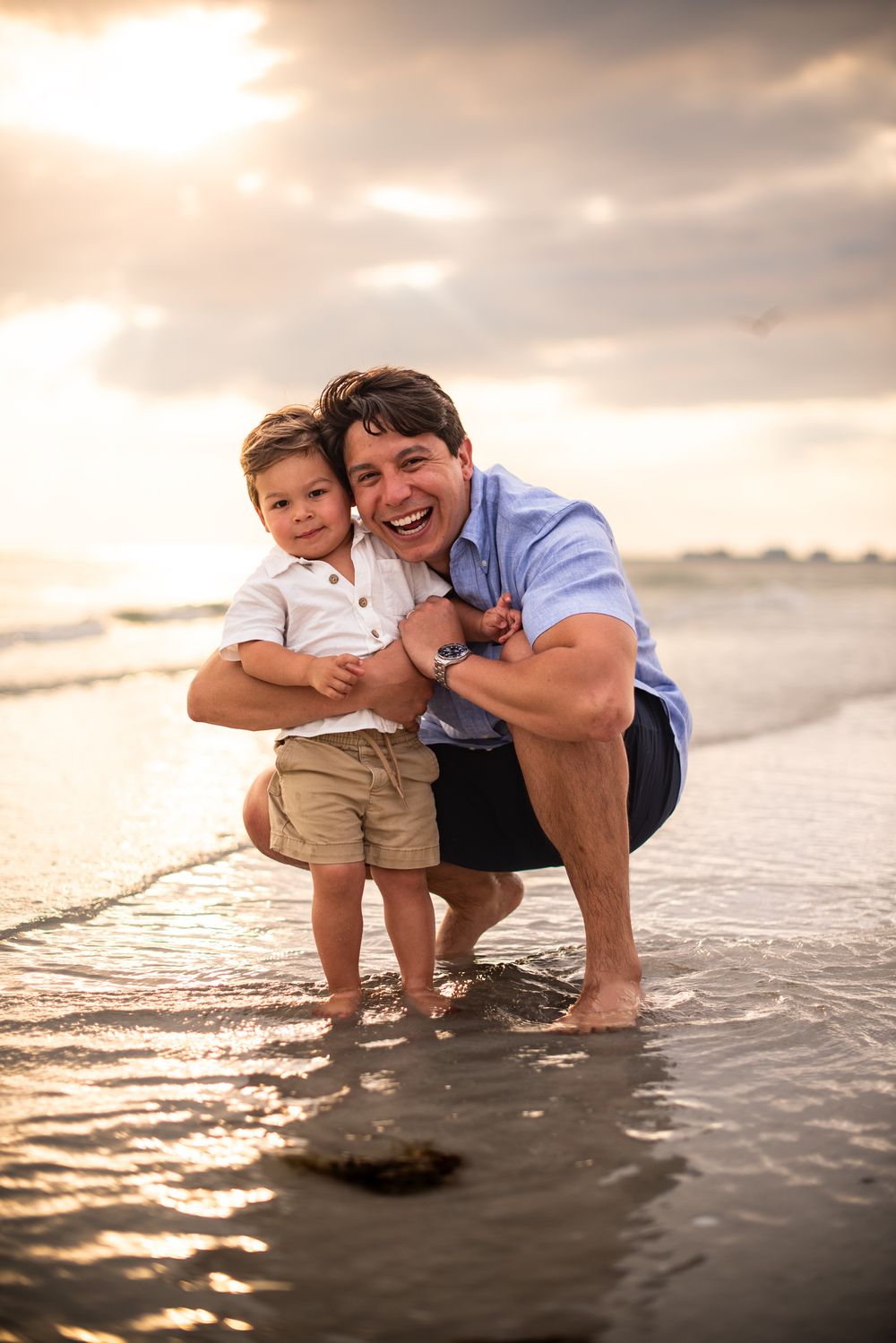 Father and son enjoying the warm waters of the Gulf of Mexico. Favorite things to do while staying in Destin Florida