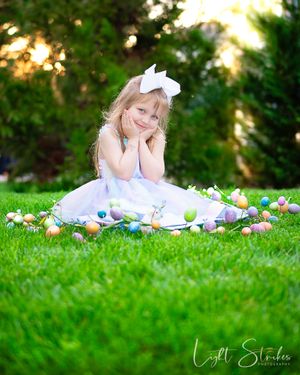 Easter session and spring mini session in Charlotte with Easter-themed props, Easter eggs, Easter bunny. Perfect for children portraits.