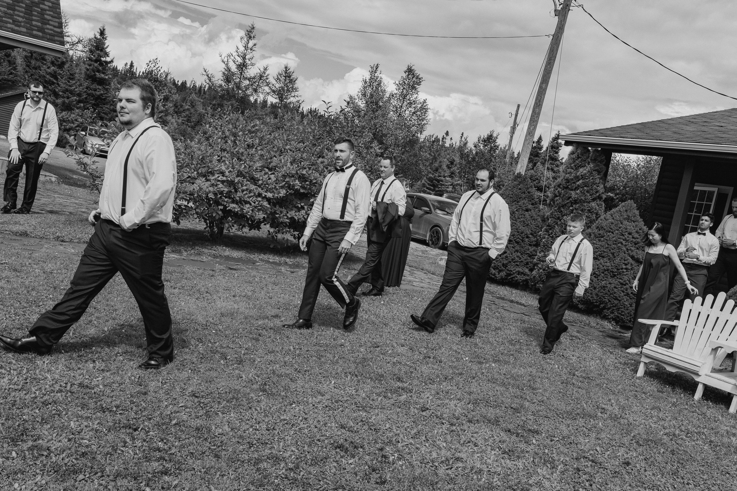 Groomsmen walking outside