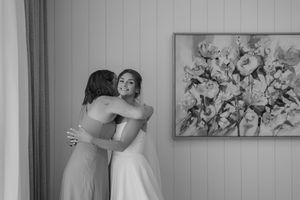A series of black and white wedding photos showing tender moments between couples during their special day.
