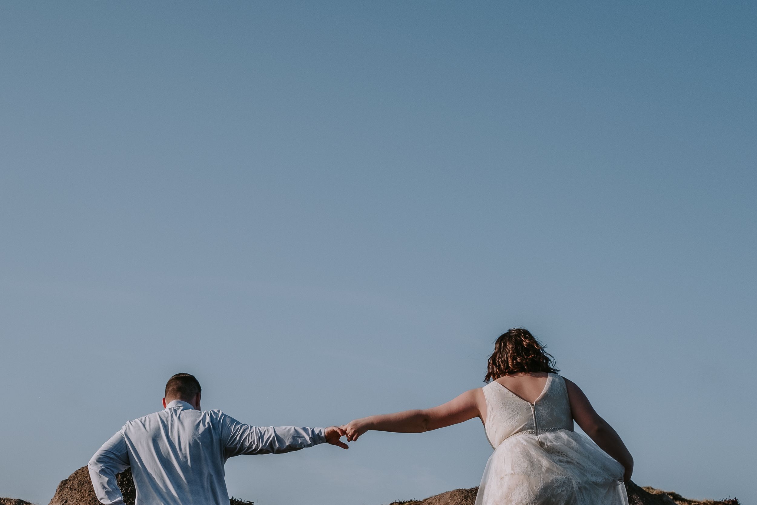 Couple walking holding hands
