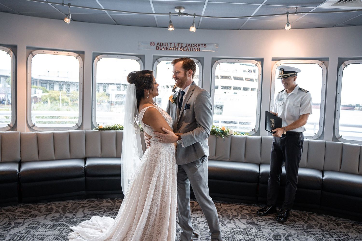 Couples dancing together on a boat deck during a sunset celebration cruise. Micro wedding on Yacht StarShip in Tampa