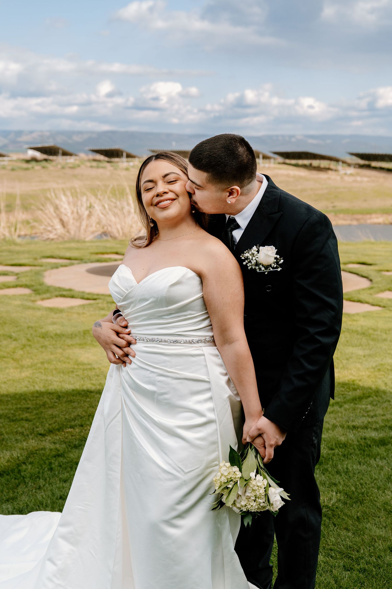 Golf club wedding portraits with the blue mountains in the backdrop