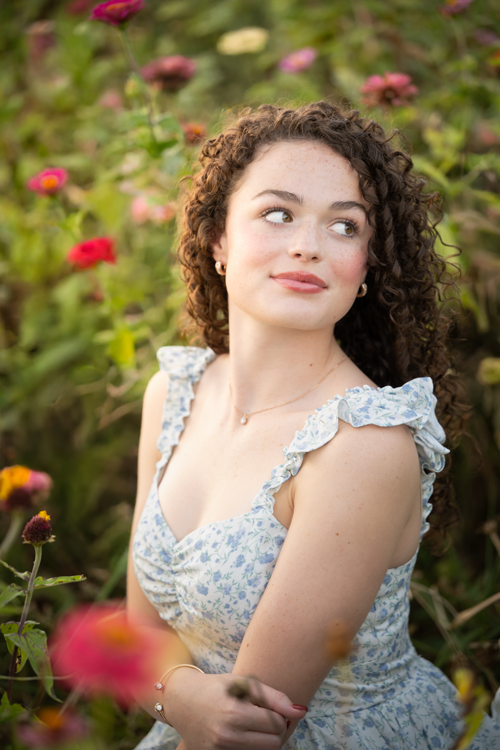 Dance Rep poses whimsically in the wildflowers in Batavia ohio for our rep session