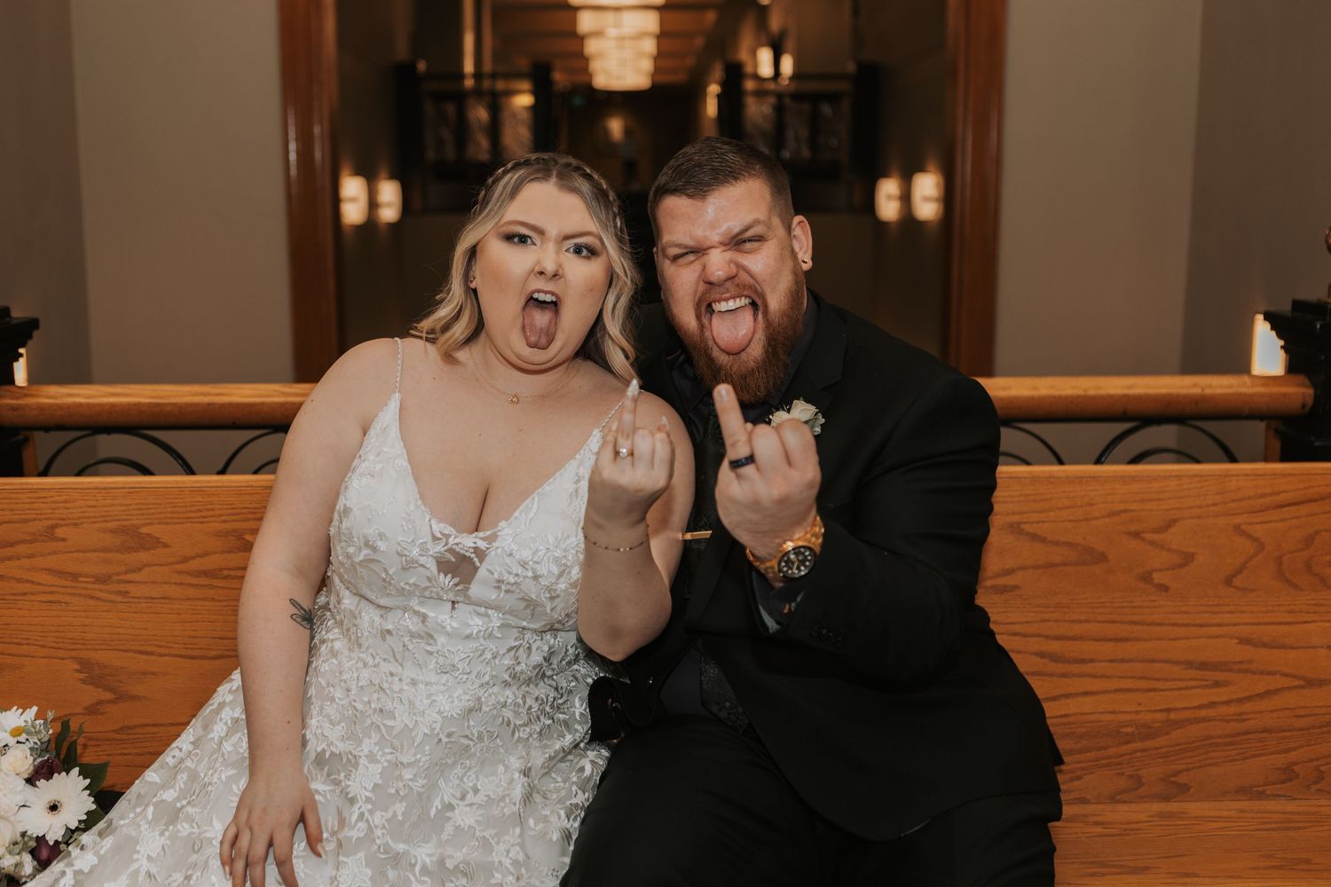A couple in wedding attire making funny faces and rock gestures in a series of photos.