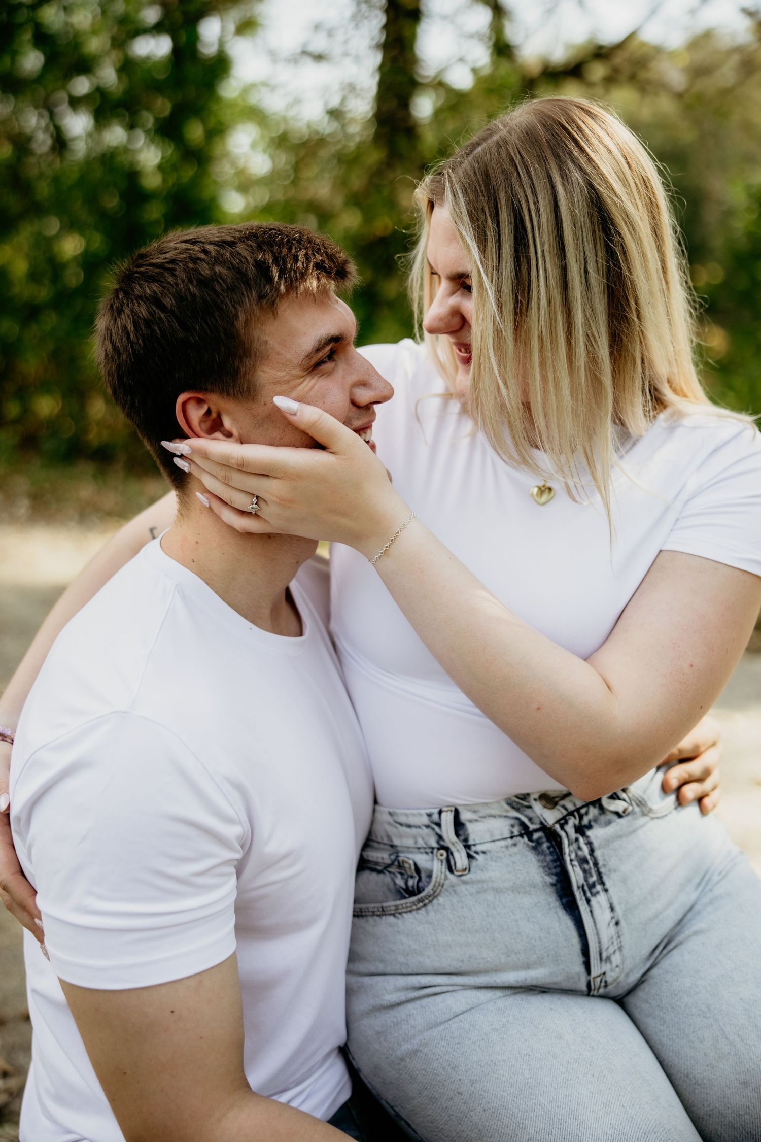 A casual photo sequence showing intimate moments between two people in white and denim.