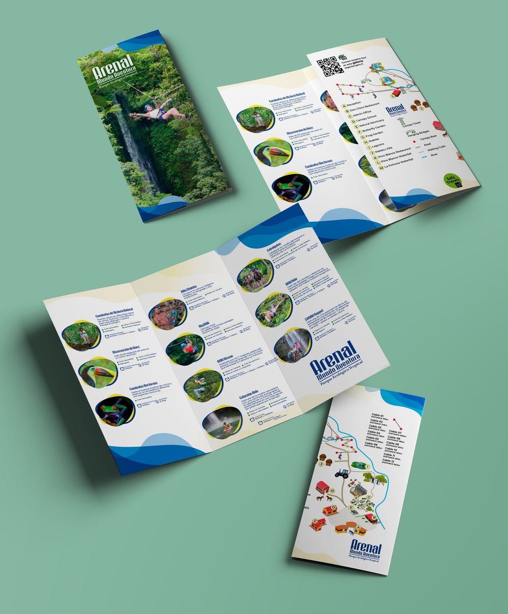 Collection of adventure brochures and maps showing outdoor activities and destinations.