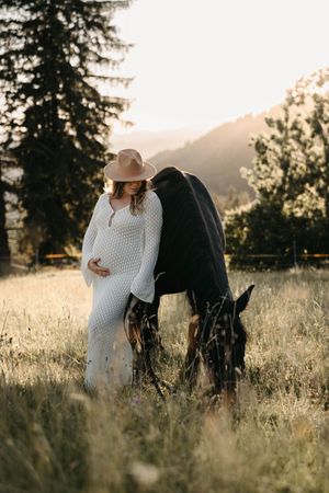 Horse and a pregnant woman